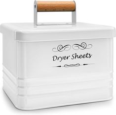 a white box with a wooden handle and the words dryer sheets written on it