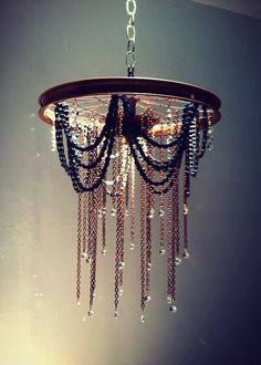 a chandelier hanging from the ceiling in a room