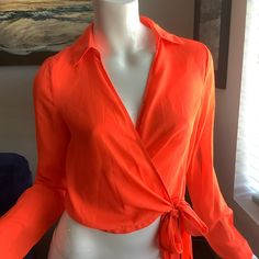 Nwt Pretty Little Thing Fluorescent Orange Long-Sleeve Wrap Blouse Size 4 100% Polyester New With Tags Spring V-neck Party Shirt, Trendy Long Sleeve Blouse For Date Night, Chic Orange Long Sleeve Blouse, Solid Color Shirt For Spring Party, Long Sleeve Shirt For Summer Night Out, Long Sleeve Blouse For Summer Date Night, Casual Wrap Top For Party, Summer Date Night Long Sleeve Blouse, Chic Orange Summer Shirt