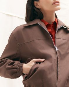 In a rich hue and with chic seam detailing, this classic bomber jacket is the cherry-on-top of any fall look. Cut from a luxe, medium-weight cotton twill, Lev is the perfect addition to your seasonal transition wardrobe. See below for our general Size Guide and available measurements Made of 100% cotton Machine wash cold and lay flat to dry Workwear Long Sleeve Utility Jacket With Zip Cuffs, Long Sleeve Utility Jacket With Zip Cuffs For Work, Long Sleeve Utility Jacket For Work, Classic Spring Outerwear With Zip Cuffs, Chic Brown Cotton Outerwear, Everyday Brown Outerwear With Ribbed Cuffs, Spring Utility Jacket With Zipper For Work, Brown Everyday Outerwear With Ribbed Cuffs, Relaxed Fit Fall Outerwear With Zip Cuffs