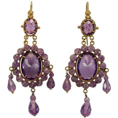 We are presenting an autstanding pair of Victorian girandole earrings with amethysts and 14K Gold. From Venice, half of the 19th century. Amethyst was thought to prevent drunkenness. The stones are "briolet" cut therefore they shine very well in all position. The girandole style was typical of Venice in that period. They are very light and elegant to wear. In perfect condition despite the age. 14K Gold (touchstone tested). Half of the 19th century from Venice. An old hallmark is on the hooks. - Amethyst Gold, Gold Dangle Earrings, Gold Earrings Dangle, Etsy Earrings Dangle, The Age, Antique Jewelry, Halloween Shopping, Jewelry Earrings Dangle, 19th Century