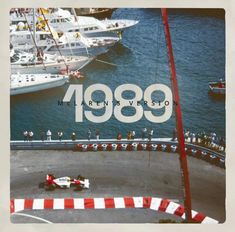 an aerial view of a race track with boats in the water and onlookers