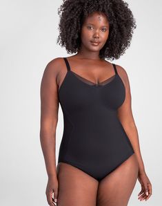 This super chic bodysuit is designed to smooth and support from bust to booty. A built-in, molded and underwire-free bra provides support without sacrificing comfort. Mesh panels at the sides create the illusion of a contoured waist, and jacquard mesh at the neckline looks pretty peeking out under clothing. Honeylove, CrossOver Cami Bodysuit for Women in Vamp (Black), Size: 3X Sculpting Shapewear With Built-in Bra And Underwire, Black Underbust Bodysuit With Built-in Bra, Contoured Full Coverage Bodysuit With Built-in Bra, Elegant Full Coverage Supportive Shapewear, Nylon Shapewear With Bra-friendly Shaping, Nylon Shapewear With Bra Friendly Shaping, Sculpting Nylon Bodysuit With Medium Bust Support, Sculpting Underwire Shapewear, Bra Friendly, Bra Friendly Sculpting Shapewear With Underwire