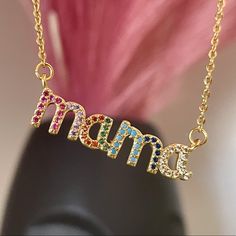 Your Mom Will Love This Stunning Multicolored Mama Necklace. This Timeless, Dainty Piece Can Be Worn Everyday On Its Own, Or Paired With Other Necklaces To Create A Trendy Layered Look. Mother’s Day Is May 9. Stainless Steel Pendant Is 1.25” Wide, .35” Tall With 18.8” Long Chain With Lobster Clasp And Chain Extension For Adjustable Length. Only 5 Available! Multicolor Necklaces For Mother's Day Birthday, Multicolor Jewelry For Mother's Day Party, Multicolor Necklace For Birthday And Mother's Day, Multicolor Jewelry Gift For Mom, Mama Necklace, Stainless Steel Pendant, Your Mom, Steel Necklace, Long Chain