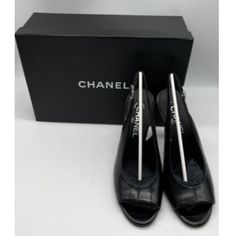 Nib Chanel Black Leather Slingback Peep Toe Interlocking Cc Logo Heel Sz 38.5 Material Leather Condition New In Box Please See Photos For Details. Approx Measurement Displayed Size 38.5 Insole Length 10" Heel 4.25" Sole 3.5" Black Slingback Pumps With 4-inch Heel For Business, Black Slingback Pumps With Leather Sole, Black Slingback Pumps With Ankle Strap For Business, Black Open Toe Slingback Pumps For Office, Black Ankle Strap Slingback Pumps For Business, Classic Black Slingback Sandals With Round Toe, Classic Black Closed Toe Slingback Sandals, Classic Black Slingback Sandals For Office, Designer Slingback Pumps With Round Toe For Work