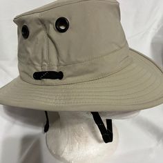 New Tilley Endurables Hat Beige Flat Brim Hat For Outdoor, Beige Short Brim Hat For Outdoor Activities, Outdoor Adjustable Fit Beige Hat, Adjustable Fit Beige Hat For Outdoor, Adjustable Safari Style Bucket Hat, Outdoor Adjustable Beige Hat, Solid Color Camping Hat With Short Brim, Solid Color Wide Brim Hats For Camping, Beige Casual Hats For Outdoor Activities