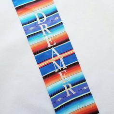 a tie with the word dream on it