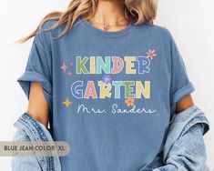 Are you looking for Custom Kindergarten Teacher Shirt? We got you! ✅ ABOUT OUR  Personalized Kindergarten Team Shirts Comfort Color T-shirt  ▸ 100% ring-spun US cotton for long-lasting comfort.  ▸  The garment is sewn around the finished edges with double stitching, making it long-lasting ▸  The garment is dyed after it's been constructed, giving it a soft color and texture ▸ Printed and shipped from the USA ✅ HOW TO ORDER your Back to School Tee 1. Check our photos for sizing and color options. Kindergarten Teacher Shirts, Photo Care, Teacher Personalized, School Tees, Kindergarten Teacher, Gift For Teacher, Kindergarten Teachers, Team Shirts, Comfort Color