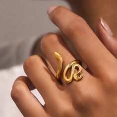 Introducing our captivating Snake Ring – a mesmerizing accessory that exudes mystique and sophistication. Crafted with precision and attention to detail, this ring features a sleek and elegant snake motif that coils gracefully around your finger. Specifications: Material: Metal Size: Adjustable Whether worn as a symbol of wisdom and intuition or simply as a bold fashion statement, this ring is sure to add a touch of intrigue and elegance to any ensemble. Slip it on and let the snake's mystique w Snake Motif, Rings Gothic, Popular Rings, Womens Dress Suits, Snake Ring, Stainless Steel Rings, Steel Ring, Ring Ring, Ring For Women