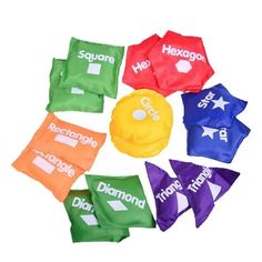 six different colored candy bags sitting on top of each other