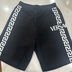 Black Boys Versace Shorts Authentic Size 12. New With Tags Casual Black Bottoms With Logo Waistband, Black Casual Shorts With Logo Waistband, Black Bottoms With Logo Waistband In Short Length, Black Bottoms With Logo Waistband, Short Length, Versace Pants, Versace Shorts, Baby Logo, Velvet Pants, Black Boys