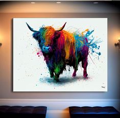 a colorful bull standing in front of a white wall