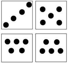 four squares with black dots on them