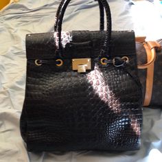 Reposhing This Item I Purchased From @Malou_chua2003. Gorgeous Chocolate Brown Embossed Leather. 14 1/2 In L X 14 In H X 9 In Deep It Expands Well Beyond 9 Inches Deep When You Shop With It. Short Handle Just Fit Over The Shoulder With A Thinner Coat Beautiful Luxury Bag. Kept In A Nob-Smoking Home Questions? Leave A Comment Below! High-end Leather Bag With Crocodile Pattern, High-end Travel Bags With Crocodile Pattern, High-end Crocodile Pattern Travel Bags, Luxury Crocodile Pattern Shoulder Bag For Daily Use, Luxury Crocodile Pattern Shoulder Bag, Luxury Leather Bag With Crocodile Pattern, Luxury Satchel With Crocodile Pattern Tote, Designer Satchel Shoulder Bag With Crocodile Pattern, Luxury Evening Bag With Crocodile Pattern