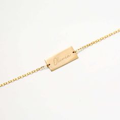 Discover the timeless elegance of the Engravable Bar Bracelet in 14K Solid Gold. This customizable piece, perfect as a name bracelet for women, is available in yellow, rose, or white gold. It's not just a bracelet, but a statement of style, allowing you to wear your initials or a significant name close to your heart. This 14k gold piece is the perfect blend of luxury and personalization, ensuring you stand out in any crowd. 14k solid gold handcrafted pieces 100% ethical sourced jewelry Material: Classic Personalized Rectangular Bracelets, Classic Personalized Rectangular Bracelet, Elegant Rectangular Jewelry With Engraving Option, Minimalist Engraved Rectangular Bracelets, Classic Personalized Rectangular Name Bracelet, Minimalist Personalized Rectangular Bracelet, Elegant Name Bracelets With Rectangular Shape, Elegant Sterling Silver Name Bracelet With Engraving Option, Minimalist 14k Gold Jubilee Name Bracelet