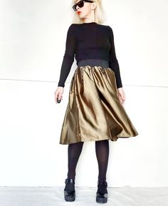 "Satin olive green midi skirt with elastic waist band . Shiny and classy the skirt can be worn not only in formal occasions  but also everyday with sweaters  cardigans, boots, even sneakers. You can also wear it as a full dress . Limited edition. Size One O/S  Measurements : Waist : 74 cm - 29\" up to 108 cm - 42.5\" fully stretched waist band Length : 70 cm - 27.3\" Made with Love." Vintage Style Skirts, Olive Green Skirt, Womens Grey Sweater, Silk Slip Skirt, Green Midi Skirt, Green Mini Skirt, Oversized Sweater Women, Woven Sweater, Handmade Skirts