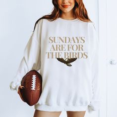 Go Birds This Sundays are for the Birds heavy blend crewneck sweatshirt is a must for this season. Wear this sweatshirt to the next game, whether you're catching the game at the Linc, Xfinity Live, or at home, show your love for the underdogs of the game. Our comfortable sweatshirt showcasing the vibe of the city is sure to be an instant favorite. This sweatshirt makes a great gift for you, your family, a friend, your boss, a co-worker, and everyone!!  Ideal for any situation, a unisex heavy ble Fall Fan Merchandise Sweatshirt With Text Print, Fan Gear Sweatshirt With Lettering, Crew Neck, Crew Neck Sweatshirt With Lettering For Fan Gear, Fan Gear Text Print Crew Neck Sweatshirt, Crew Neck Sweatshirt With Text Print For Fans, Fall Fan Apparel Sweatshirt With Text Print, Philly Football, Eagles Sweatshirt, For The Birds