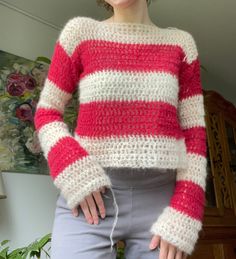 Crocheted striped sweater. 77% Alpaca, 23% Silk. Hand wash only. The yarn ends that you can see in the pictures will be weaved in before shipping. For reference: I wear size S, my bust circumference is approximately 78 cm. The sweater has a lot of stretch, fits size XS-L. Crochet Sweater Striped, White Long Sleeve Sweater With Horizontal Stripes, White Knit Sweater With Horizontal Stripes, Striped Knit Sweater For Fall, Cozy Knitted Striped Tops, Cozy Striped Knitted Tops, Stripe Crochet Sweater, Crochet Striped Sweater, Striped Crochet Sweater