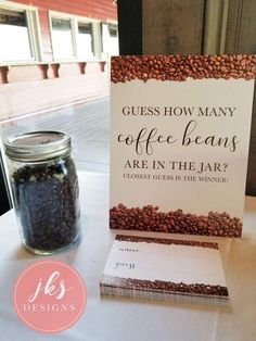 coffee beans are in the jar next to a sign that says guess how many coffee beans are in the jar?