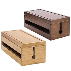 two wooden boxes with handles are shown side - by - side, one is open and the other has a drawer