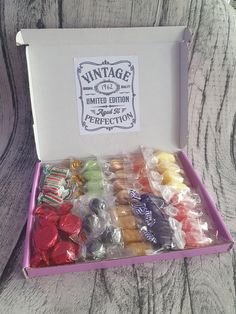 a box filled with lots of different types of candies