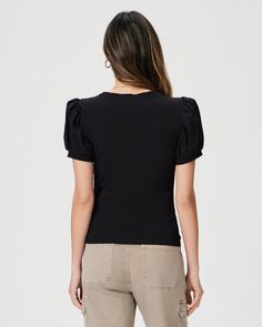 This short puff sleeve crew neck tee is the perfect mix of feminine and cool. Crafted from supremely soft cotton jersey in black, the Matcha Tee easily pairs well with any pair of denim in your closet. Casual Puff Sleeve T-shirt With Relaxed Fit, Trendy Relaxed Fit Puff Sleeve Top, Cotton Fitted Puff Sleeve Top, Trendy Black Puff Sleeve Top, Black Casual Puff Sleeve Top With Short Sleeves, Casual Black Puff Sleeve Top With Short Sleeves, Casual Fitted T-shirt With Puff Sleeves, Casual Fitted Puff Sleeve T-shirt, Casual Black Cotton Puff Sleeve Top