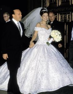 the bride and groom are walking down the aisle