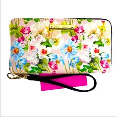 Betsey Johnson Floral Zip Around Wallet With Wristlet Strap. Floral With Light Pink Background. Gold Toned Hardware. 12 Credit Card Slots, Bill Compartments And Zippered Coin Compartment. Measurements: (Approx.) 8" W X 4.5" H. Tags: Clutch, Wristlet, Cute, Chic, Cool, Fun, Flowers, Colorful, Pretty. Flower Wallet, Light Pink Background, Betsey Johnson Wallet, Flowers Colorful, Background Gold, Pink Wristlet, Pink Box, Coin Purse Wallet, Betsey Johnson Bags