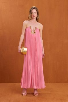 A strapless, flowy plissé maxi dress with an adjustable gold toned hardware cutout at the center bust. — Maxi length — Plissé fabric — Adjustable sculptural gold hardware at the bust — Straight cut back Cult Gaia Dress, Plisse Fabric, Evening Flats, Sandal Platform, Cult Gaia, Marchesa, White Summer, Cozy Fall, Straight Cut