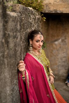 Obaid Sheikh Exclusive CollectionA color-block outfit with georgette Mukesh work and a bold, purple border, paired with a fuchsia pink chiffon dupatta with raw silk and embroidered flower motifs. Worn with a green kurti with raw silk, embroidered sleeves. Pink Anarkali Set With Cutdana In Chinon, Pink Chinon Anarkali Set With Cutdana, Pink Chandbali Salwar Kameez In Georgette, Pink Georgette Salwar Kameez With Cutdana, Designer Georgette Salwar Kameez Chandbali Style, Pink Kundan Sets With Sheer Dupatta, Pink Georgette Anarkali Set With Pallu, Pink Chandbali Shaped Dupatta In Chinon, Pink Georgette Salwar Kameez With Pallu