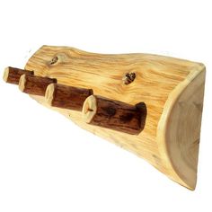 a piece of wood that has holes in it and is made to look like an instrument