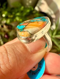 🌟 Welcome to Shine Bright Crystals! 🌟 Size: 7 Discover the vibrant beauty of this spiny oyster turquoise sterling silver ring, crafted in size 7. Featuring a stunning natural gemstone, this handmade piece adds a touch of boho elegance to any outfit and makes a unique gift for her. 🌺 Size 7: Perfect fit for those seeking a beautifully designed ring in size 7. 🌺 High-Quality Sterling Silver: Durable and tarnish-resistant for long-lasting wear. 🌺 Natural Spiny Oyster Turquoise Gemstone: Each ring showcases a unique combination of spiny oyster and turquoise, known for its vibrant colors and protective properties. 🌺 Elegant Design: Combines boho style with classic elegance, suitable for any occasion. 🌺 Perfect for Any Occasion: Ideal for daily wear, special events, or as a thoughtful gif Turquoise Multi-stone Ring For Gift, Unique Turquoise Multi-stone Opal Ring, Unique Turquoise Opal Ring With Multi-stone Design, Unique Multi-stone Turquoise Ring, Unique Oval Multi-stone Turquoise Ring, Southwestern Chrysocolla Gemstone Rings, Southwestern Turquoise Opal Ring Gift, Unique Multi-stone Turquoise Ring For Anniversary, Southwestern Style Turquoise Opal Ring As Gift