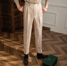 Introducing our Italy High Waist Trousers, a sartorial tribute to the timeless elegance of Old Money style. Tailored specifically for the sophisticated man, these trousers encapsulate an air of refined charm and stately sophistication. These trousers are meticulously crafted from premium, high-grade polyester - a fabric chosen for its durability and lightweight feel. Comfortable yet resilient, this material ensures these trousers maintain their tailored look throughout the day. With easy care an Semi-formal Beige Trousers, Elegant Slim Fit Winter Pants, Classic Winter Dress Pants For Business Casual, Elegant Pants With Welt Pockets For Fall, Elegant Fall Pants With Welt Pockets, Luxury Straight Leg Dress Pants For Semi-formal Occasions, Timeless Fitted Ankle-length Pants, Fitted Timeless Ankle-length Pants, Winter Formal Slim Fit Pants