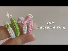 three crocheted hair clips in the shape of letters m and w, on top of each other