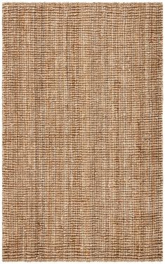 an area rug made out of jute and woven with some brown stripes on it