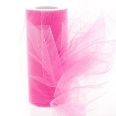 a roll of pink tulle on a white background