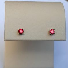 Ruby Stud Earrings Natural Rubies size: 3MM grade: AA color: red prong-set in 14K gold with push-back closures Very deep red, glowing and sparkly rubies. They are absolutely stunning! Rubies of this quality are becoming very rare and this is your chance to own a pair.  Perfect for a second piercing or to wear all on their own. Arrives thoughtfully packaged with a gift box and complimentary polishing cloth. Red 14k Gold Pierced Earrings, Yellow Gold Ruby Earrings With Brilliant Cut, Red Brilliant Cut Fine Jewelry Earrings, Red Lab-created Ruby Jewelry, Red Jewelry With Round Stone In Prong Setting, Formal Rose Gold Ruby Earrings, Red Diamond Gemstone Earrings, Classic Red Jewelry With Round Cut, Classic Red Round Cut Jewelry