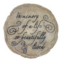 a stone with writing on it that says the memory of a life so beautifully lived