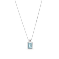 This Emerald Cut Aquamarine Pendant Necklace is a stunning shade of light blue, featuring an emerald cut aquamarine weighing approximately 1 carat. Elegant Aquamarine Necklace For Formal Occasions, Luxury Light Blue Brilliant Cut Jewelry, Luxury Aquamarine Necklace For Formal Occasions, Formal White Gold Aquamarine Necklace, Elegant Aquamarine Baguette Cut Jewelry, Elegant Baguette Cut Aquamarine Jewelry, Classic Light Blue Brilliant Cut Jewelry, Light Blue Aquamarine Jewelry With Diamond Accents, White Gold Aquamarine Gemstone Necklace