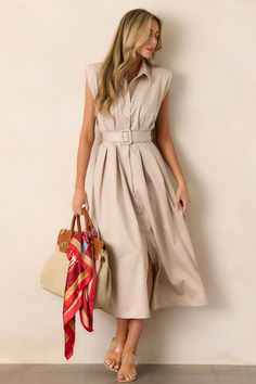 Conquer any adventure in our Days Go By Beige Belted Midi Dress. With its sleek and versatile beige design, this dress is the perfect bold statement for any journey. The belted waist adds a touch of challenge and adventure to your look. Empower yourself and stand out in this midi dress! This beige dress features built-in shoulder pads, a functional belt and a functional button front. September Style, September Fashion, Beige Design, Of Challenge, Midsize Outfits, Halter Bridesmaid Dress, Well Dressed Women, Beige Dress, Belted Midi Dress