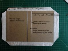 an origami cut out of brown paper with instructions