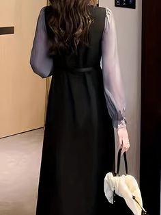 Black Belted Dresses For Fall, Black Long Sleeve Dress With Belt, Black Belted Midi Dress For Work, Belted Black Dress For Office, Black Belted Office Dress, Black Office Lady Dress For Winter, Black Winter Dress For Office Lady, Winter Black Office Lady Dress, Black Knee-length Dress With Belt