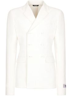 a women's white blazer jacket with buttons on the front and lapel