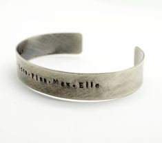 "Oxidized Sterling Silver Personalized 1/2 in wide Cuff Bracelet, Double Sided, Gift for Man, Anniversary, Father's Day Hidden Message, Wedding, Keepsake This beautiful cuff with rustic finish makes a perfect gift for both men and women. It is hand stamped with the text of your choice - I can be names, phrase, song lyrics. It can be stamped on the inside or outside of the bracelet up to 60 characters on either side. If you need a longer quote please contact me for pricing. Pictured cuff has a ox Rustic Stamped Cuff Bracelet Gift, Rustic Bangle Cuff Bracelet As Gift, Rustic Silver Bracelets For Gifts, Rustic Silver Bracelet For Gift, Rustic Stamped Bracelets For Gifts, Rustic Stamped Bracelets For Gift, Personalized Cuff Bracelets, Custom Jewelry Box, Christmas Gift For Him