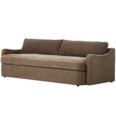 a brown couch sitting on top of a white floor