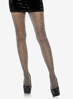 Tight Thigh-high Party Hosiery, Winter Party Tights, Glamorous Thigh High Tights, Thigh High Hosiery For Winter Parties, Glamorous Stretch Tights For Party, Glamorous Thigh High Hosiery For Night Out, Metallic Tight Party Bottoms, Glamorous Thigh-high Hosiery For Night Out, Glamorous Stretch Thigh High Tights