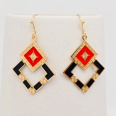 Add some shape to your style game with these playful geometric square earrings. Made with light weight gold plating, these earrings feature intricate red and black enamel detailing for a unique touch. A fun and stylish addition to any outfit. Size: 0.99inch*1.88inch Kimono Outerwear, Love Coupons, Flirty Dresses, Square Earrings, Black Enamel, Red And Black, Gold Plating, Perfect Outfit, New Outfits