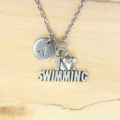 ♥ Swimming Necklace Silver I Love Swimming Charm Necklace Sport Gift Swimming Charms Swimming Gift Initial Necklace ♥ This is a beautiful I Love Swimming charm with hand stamped initial charm on a stainless steel chain, You able to choose initial from a drop down menu, ♥ You will receive 1 necklace ♥ I Love Swimming charm 15x22x2 mm ♥ Initial charm 10 mm choose from a drop down menu ♥ Stainless steel chain 18 inches ♥ additional initial https://www.etsy.com/listing/766732811 If you need help wit Personalized Silver Charm Necklace For Anniversary, Hand Stamped Charm Necklace For Valentine's Day, Personalized Metal Jewelry For Anniversary Gift, Silver Metal Charm Necklace For Birthday, Nickel Free Adjustable Charm Necklace For Valentine's Day, Adjustable Nickel-free Charm Necklace For Valentine's Day, Nickel-free Adjustable Charm Necklace For Valentine's Day, Personalized Metal Jewelry For Birthday Gift, Stamped Jewelry For Valentine's Day Gift