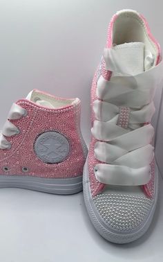 "Pearl HighTop Custom Bling Converse Unisex. Personalize Bridal, Wedding, Sorority, Sweet 16, Anniversary, Party Shoes Bedazzled Gift Idea, Quinceanera, Can do any color requested.. These Converse are a custom color. Normal converse do not come in this particular color. These are special made. Do undertsand custom made orders take a little more time. Disclaimer: PLEASE READ SHOP POLICY BEFORE PURCHASING!! I'm willing to rush your order if you're willing to pay my rush fee. Please ask all questions BEFORE you purchase from my shop. I reply back to customers fairly quickly. All sales are final. It is your obligation to know the correct size needed in Converse before you order. If you receive shoes that are too big or too small, I cannot refund or exchange since they are personalized. If you Quince Shoes Converse, Pink Glitter Converse, Normal Converse, Bedazzled Shoes Diy, Quinceanera Shoes, Bedazzled Shoes, Bling Converse, Custom Bling, Custom Converse