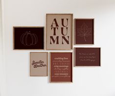 there are many framed pictures on the wall with autumn words in each one, including leaves and pumpkins